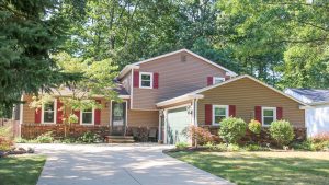 Stover after siding, gutter protection, roofing