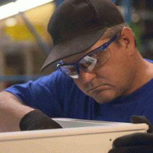 A close-up image of a technicians in the middle of an installation project.