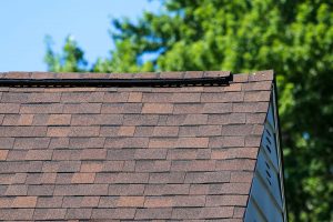 Close-up view of a brown shingle roof