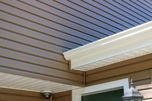 Brown siding of a house in close up