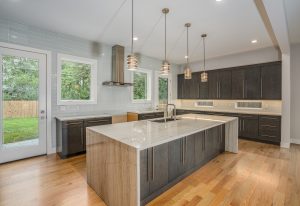 Remodeled kitchen has new cabinets and new appliances installed