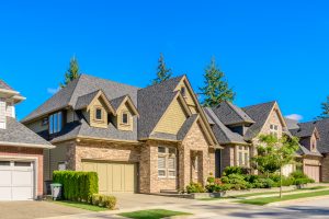 Houses in suburb at Summer in the north America. Luxury houses with nice landscape.